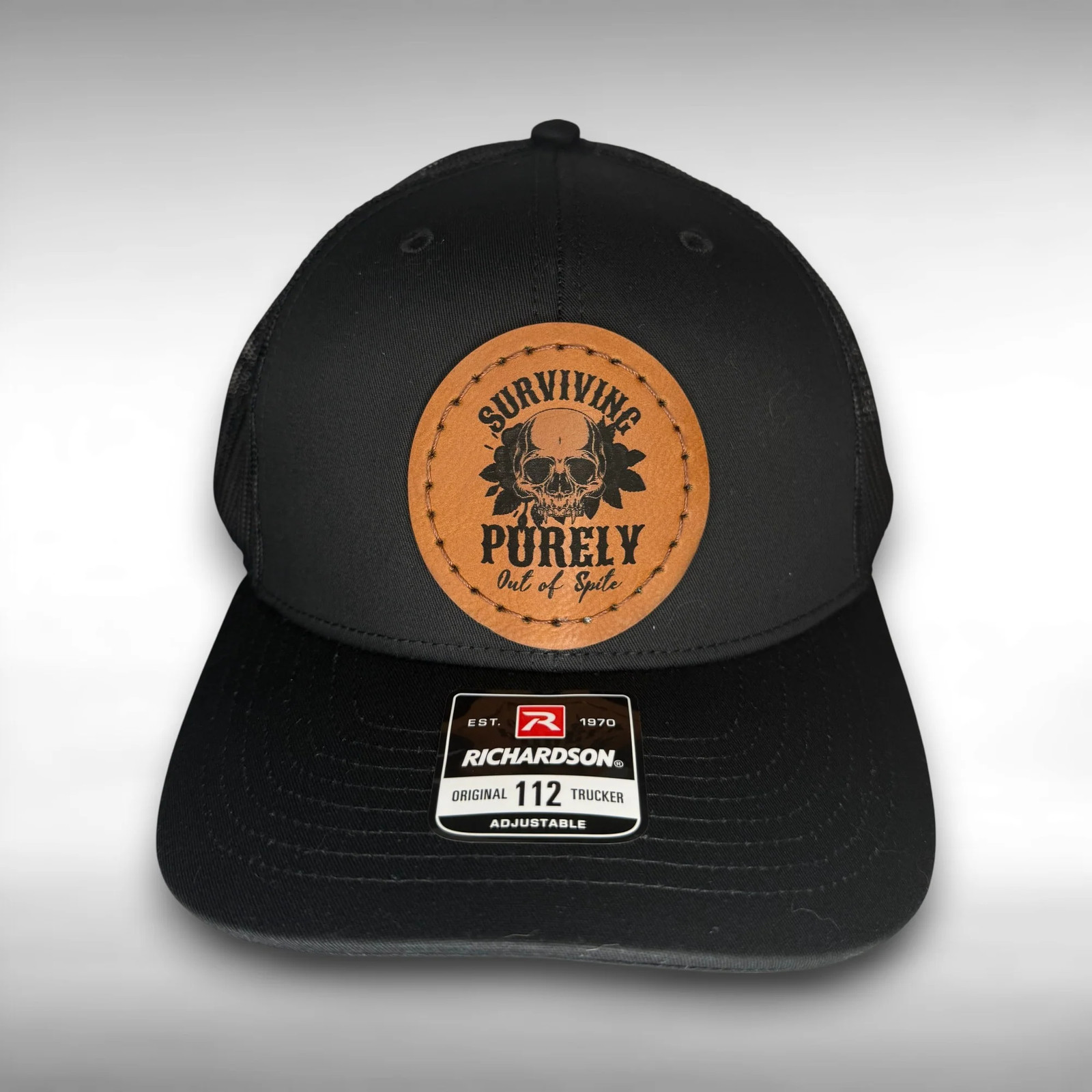 Surviving Out of Spite Hat - Skull Hand Sewn Leatherette Patch Snapback