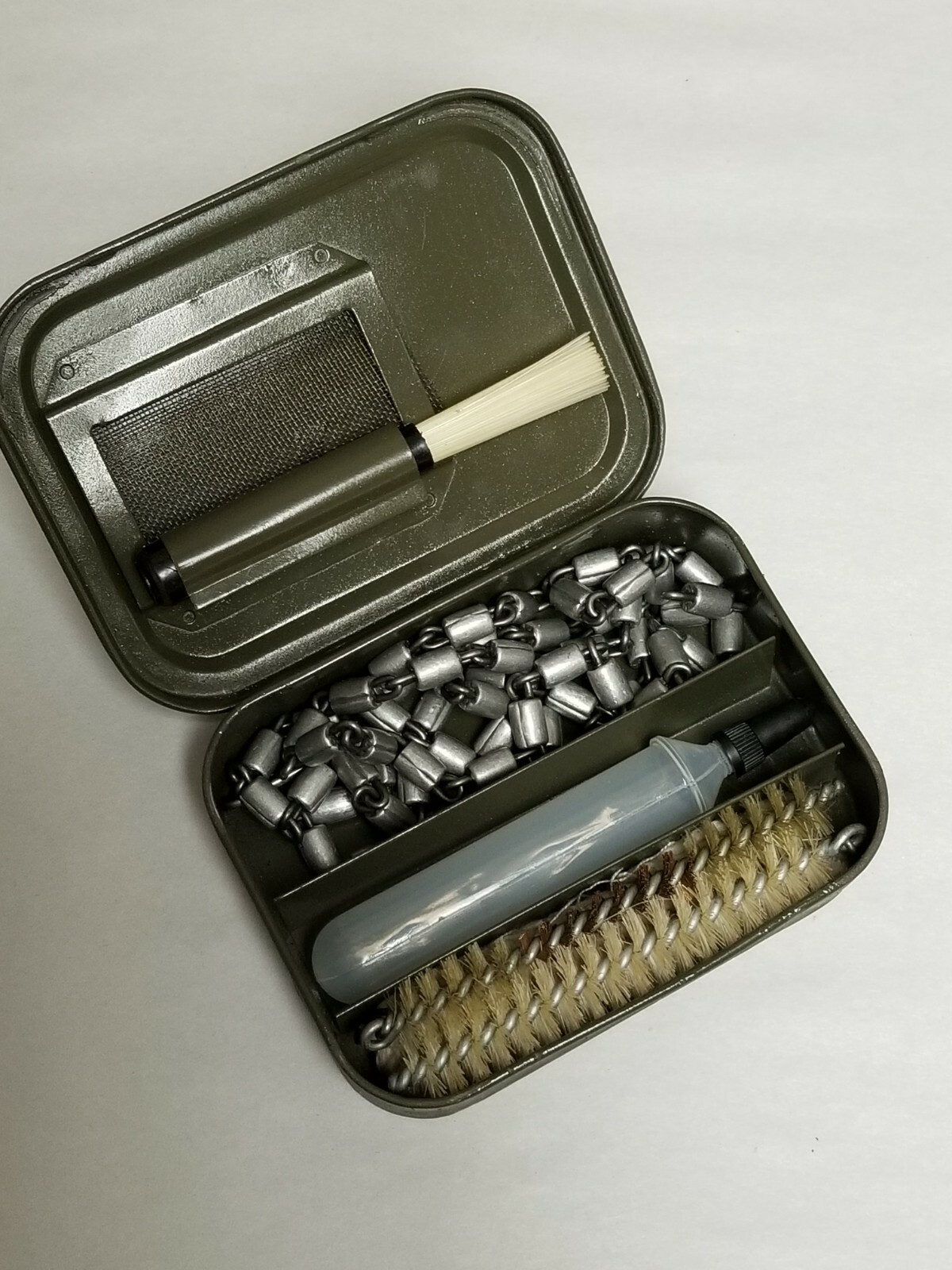 ISRAELI ARMY 9 mm CAL CLEANING SET IN METAL CAN.