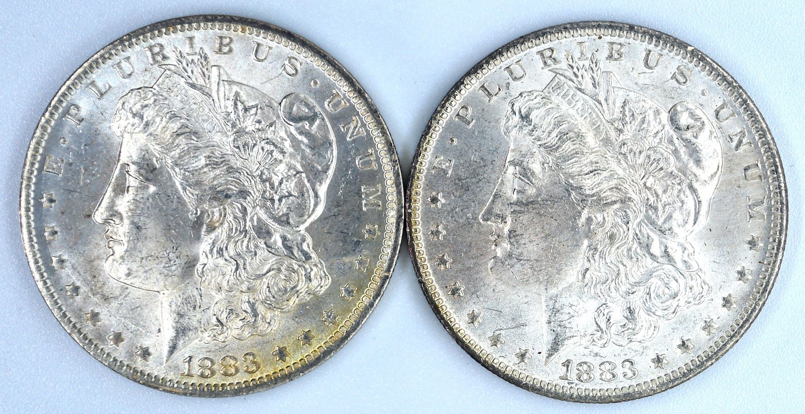 Two 1883-O Morgan Silver Dollars ~ BU