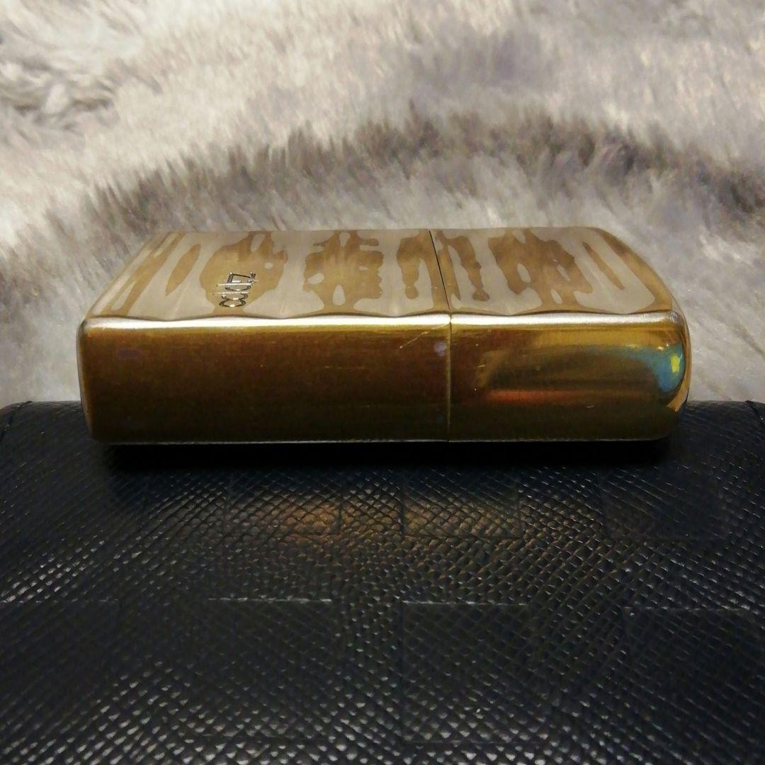 Zippo lighter, double-sided design, made in 2002.