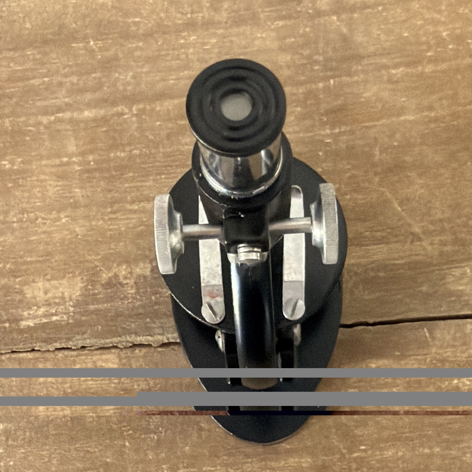 Vintage HIKA 150x Microscope 5in. Includes 3 slides and original box.