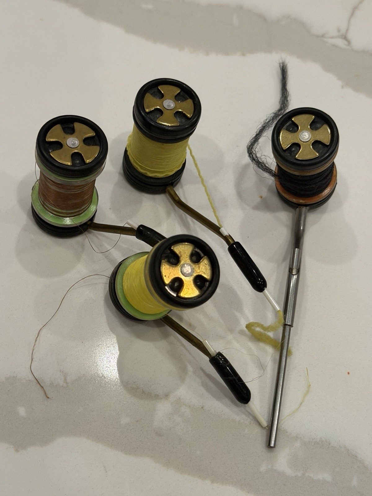 Rite Bobbins, which are specialized adjustable-tension bobbins