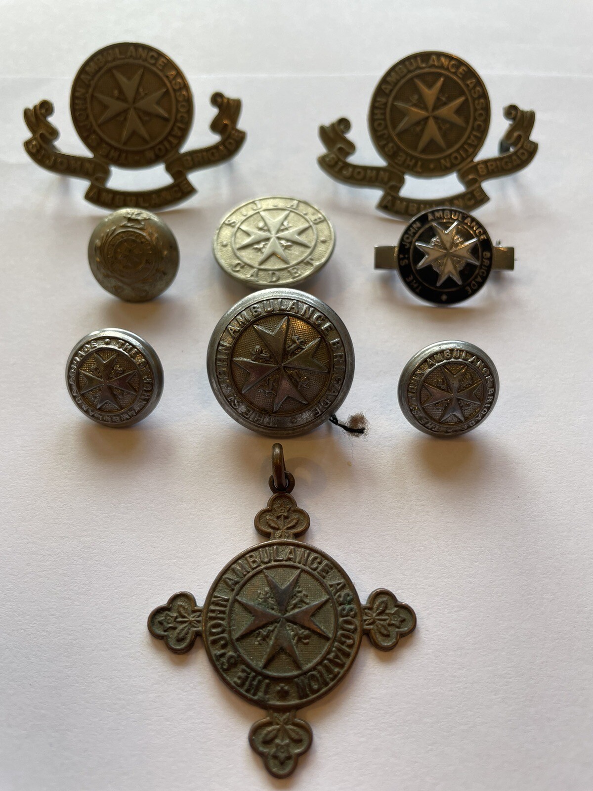 St John’s Ambulance badges and medal