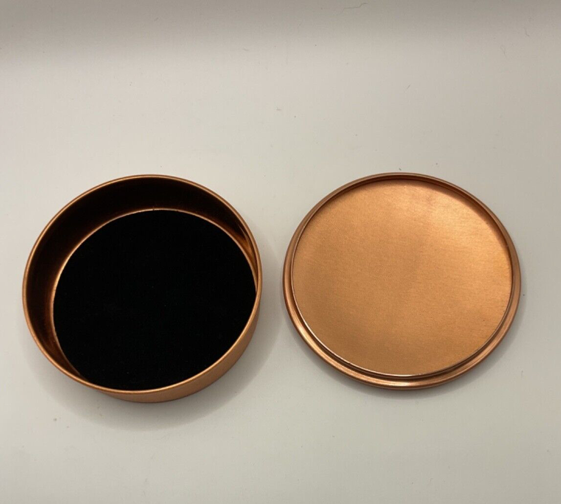 Copper lidded box from Greece 4” in diameter.