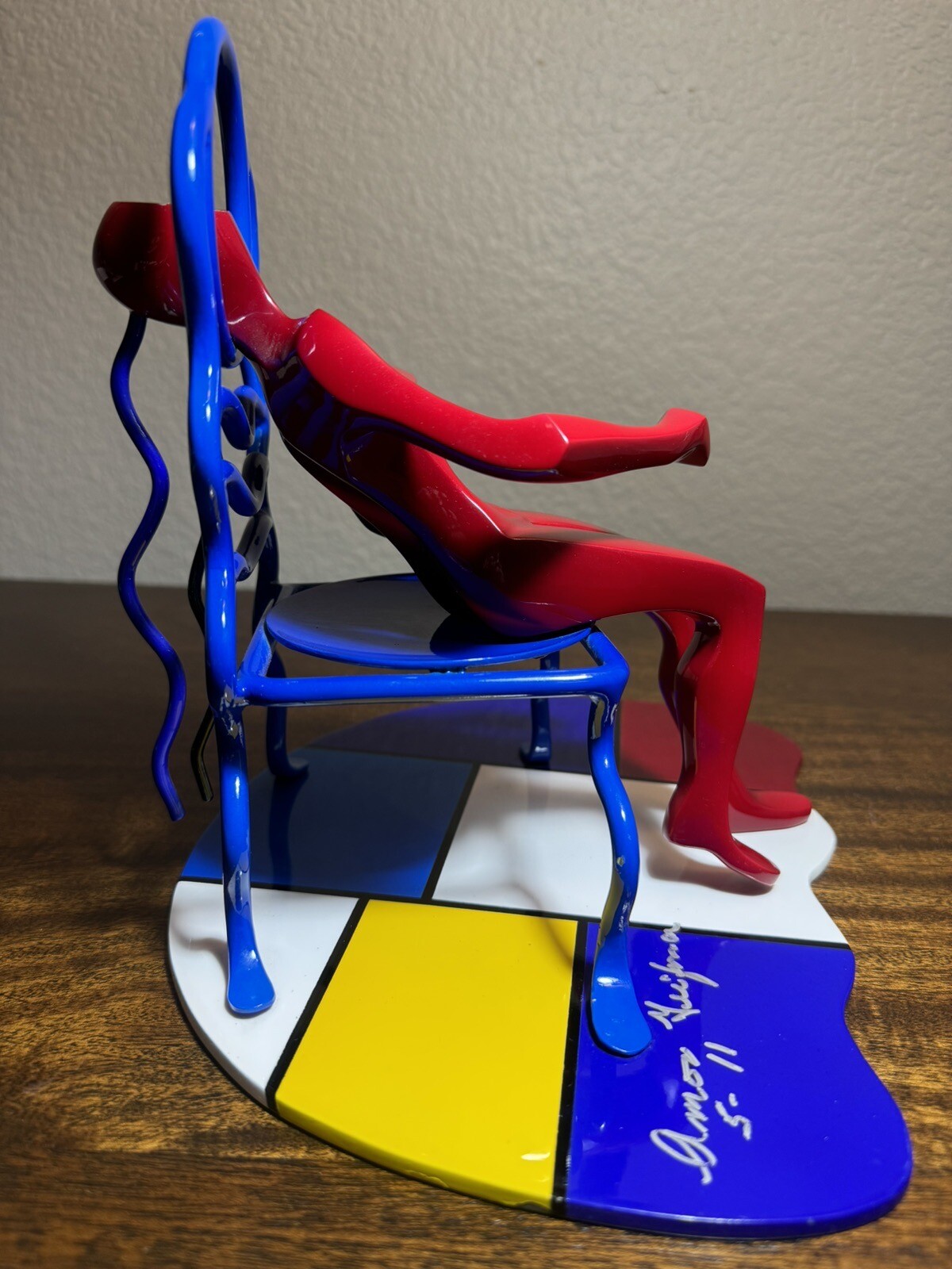 Sitting on Chair Bronze Sculpture By Amor Geifman