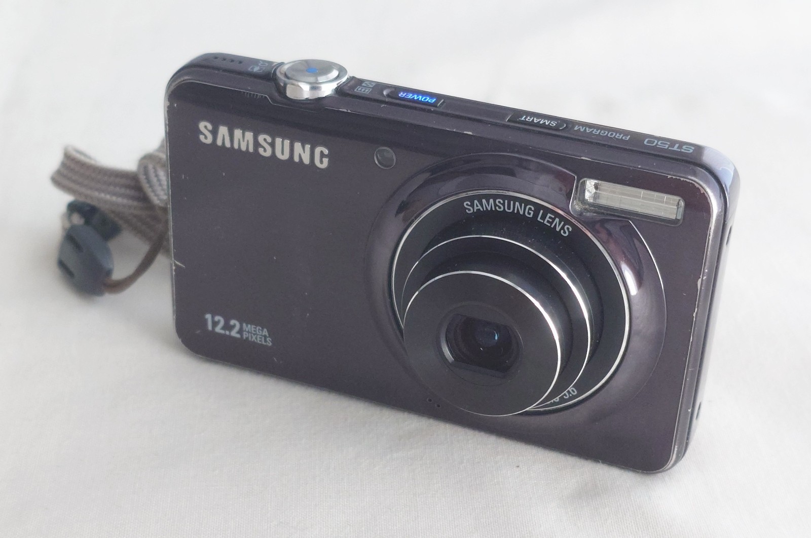 Samsung ST50 12.2MP Digital Compact Camera, With Charging Cable - Working Order