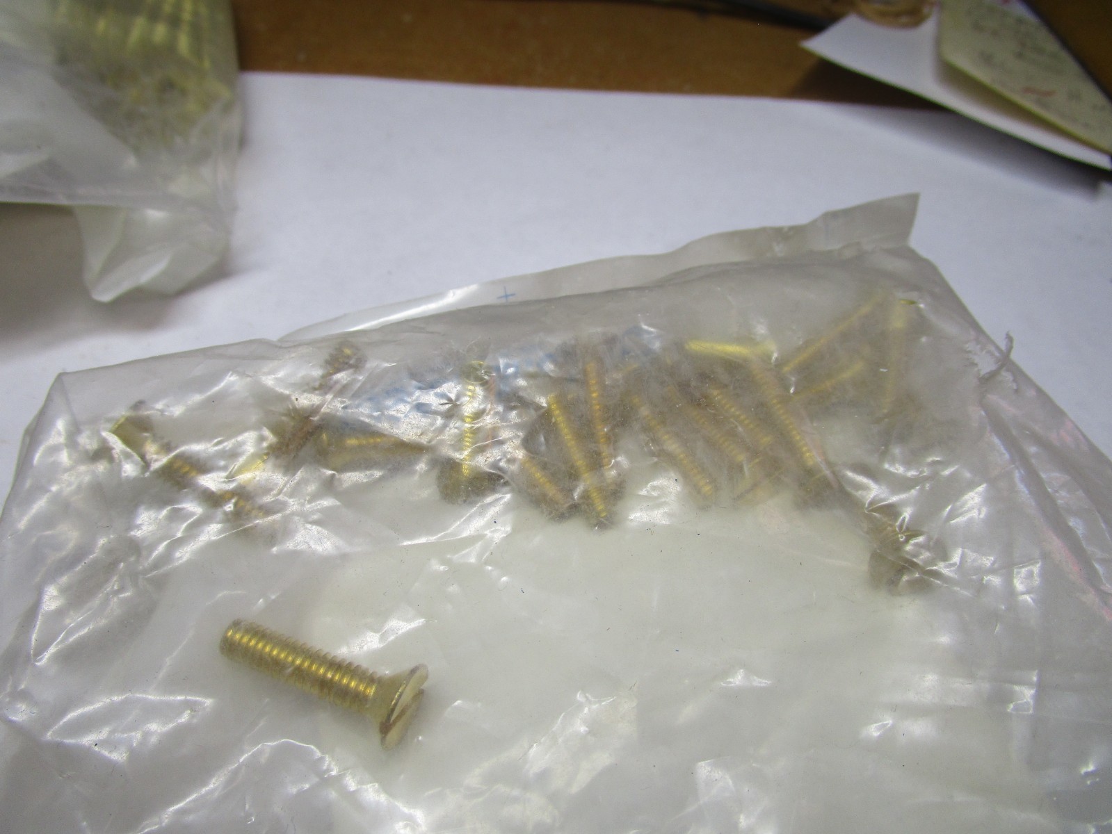 #12-24 x 1" Slotted Drive Flat Head Brass Machine Screw QTY 25