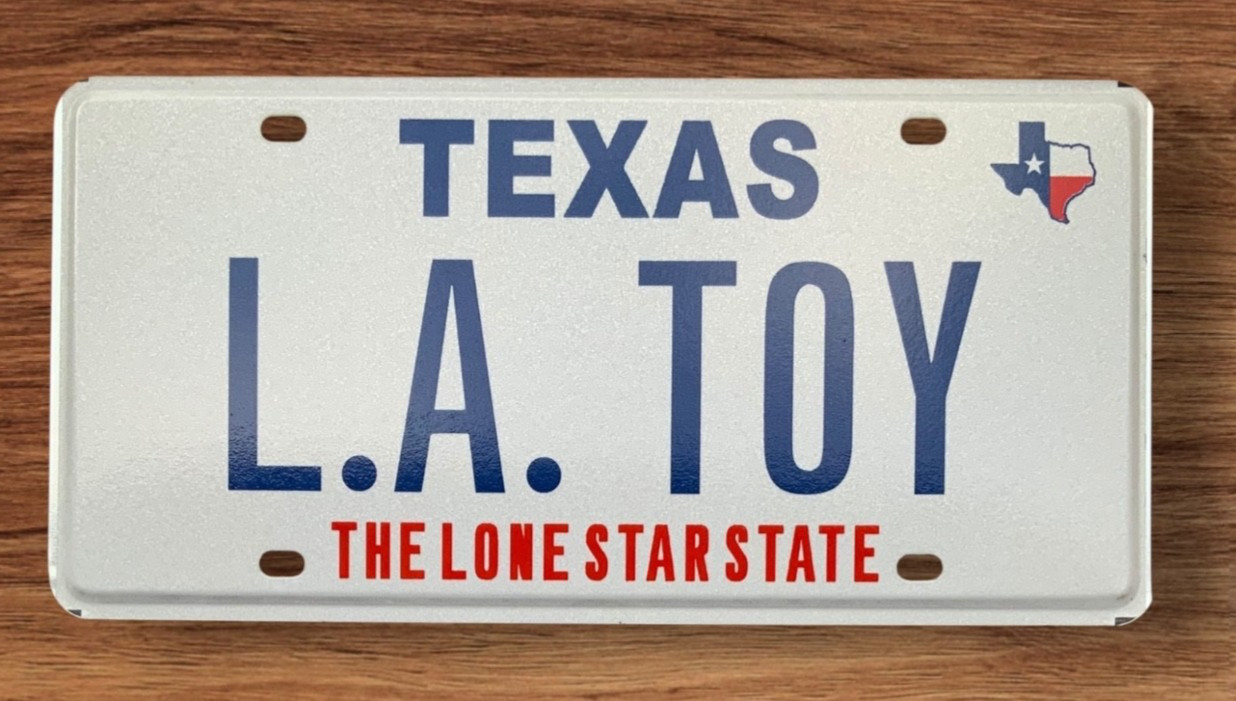 TXS  LONE STAR STATE  VANITY LICENSE PLATE " L. A. TOY " LOS ANGELES TOYOTA
