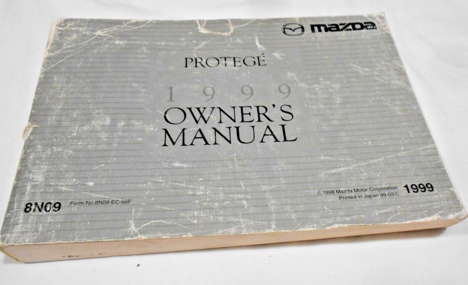 1999 MAZDA PROTEGE OWNER'S FACTORY MANUAL IN ENGLISH & FRENCH. FREE S/H