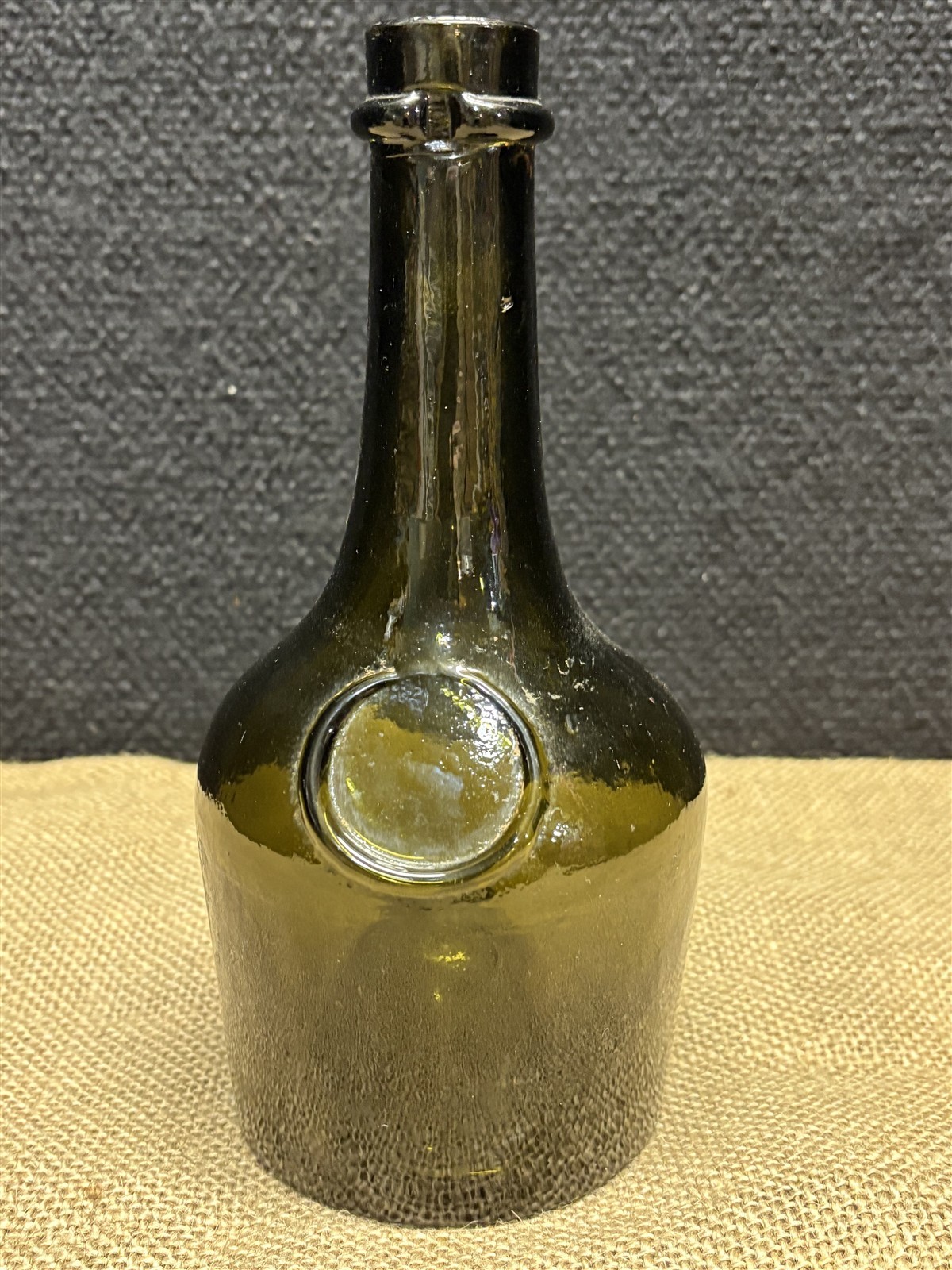 older 8.5 inch Benedictine olive green glass bottle, 3 piece mold
