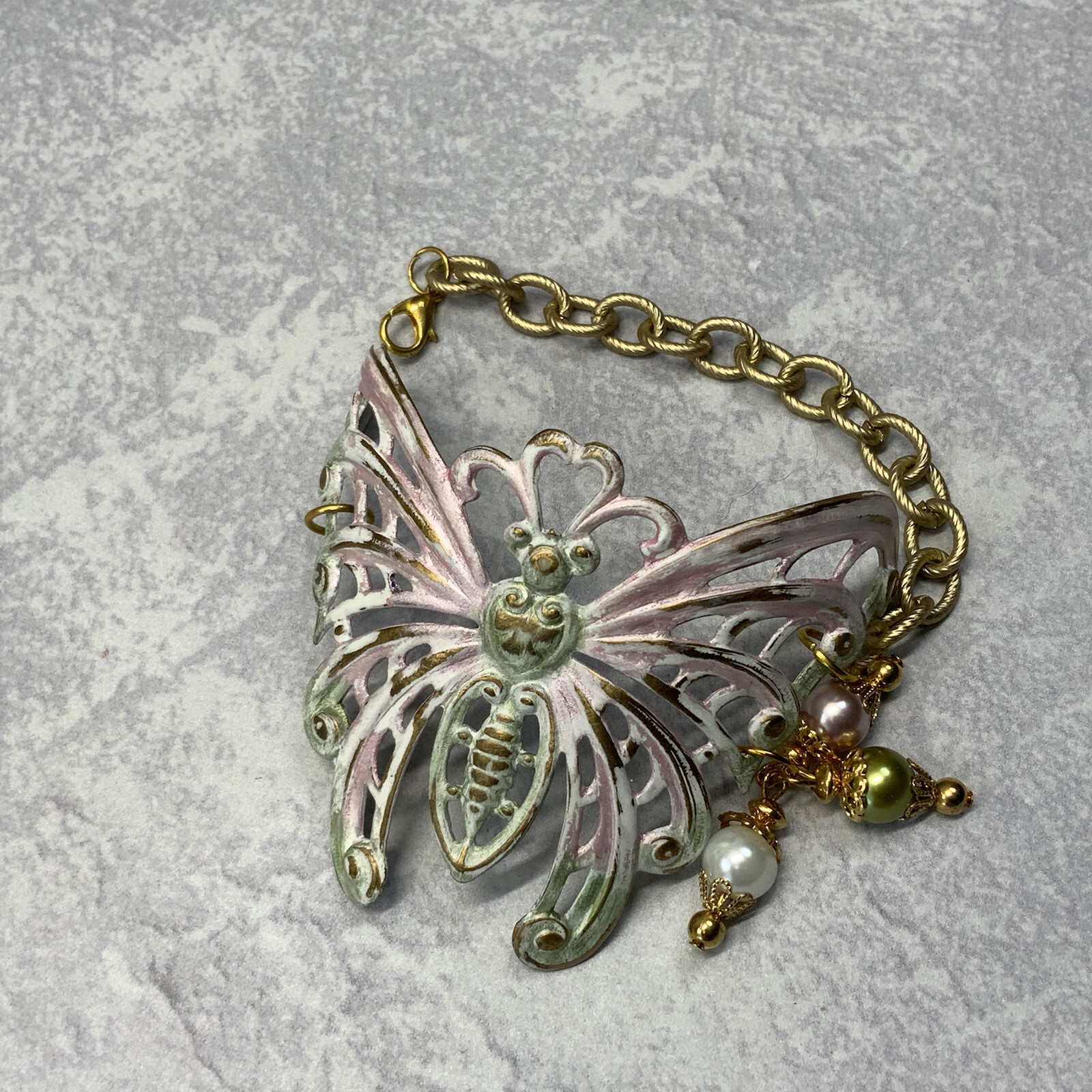Handmade pastel brass butterfly bracelet with faux pearls