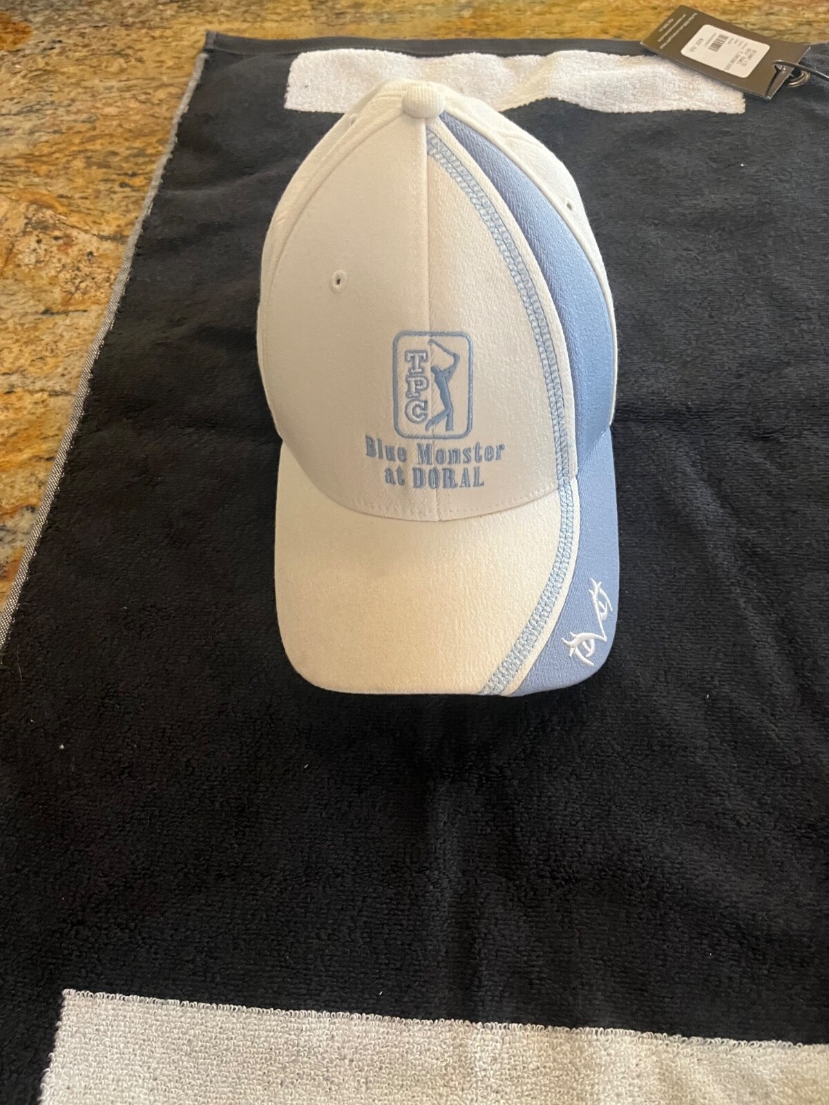 Trump doral world golf championship towel and hat