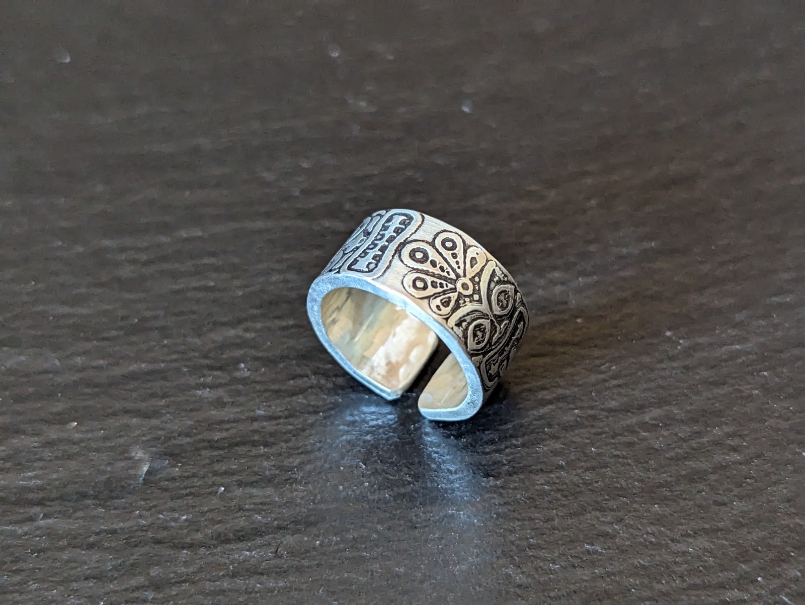 Thick sterling silver ring with tiki gods - handmade - open design