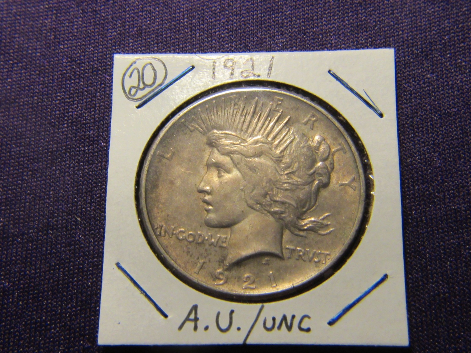 1921 Peace Silver Dollar in A.U. / UNC condition