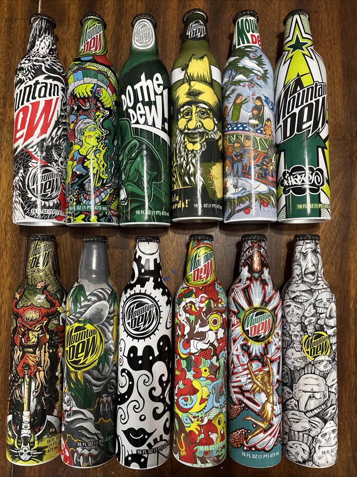 Lot Of 12 2008 Mountain Dew Green Label Art Aluminum Bottles - 6 Are FULL