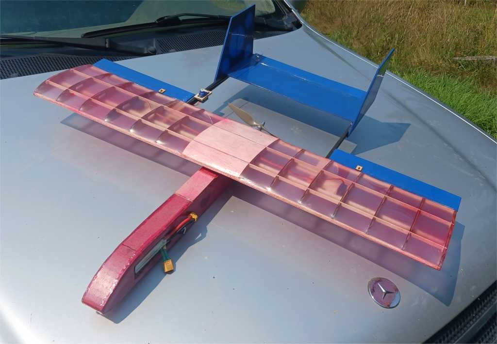 Twin Boom Pusher 34" wingspan RC plane kit.  Sports flyer, with covering.