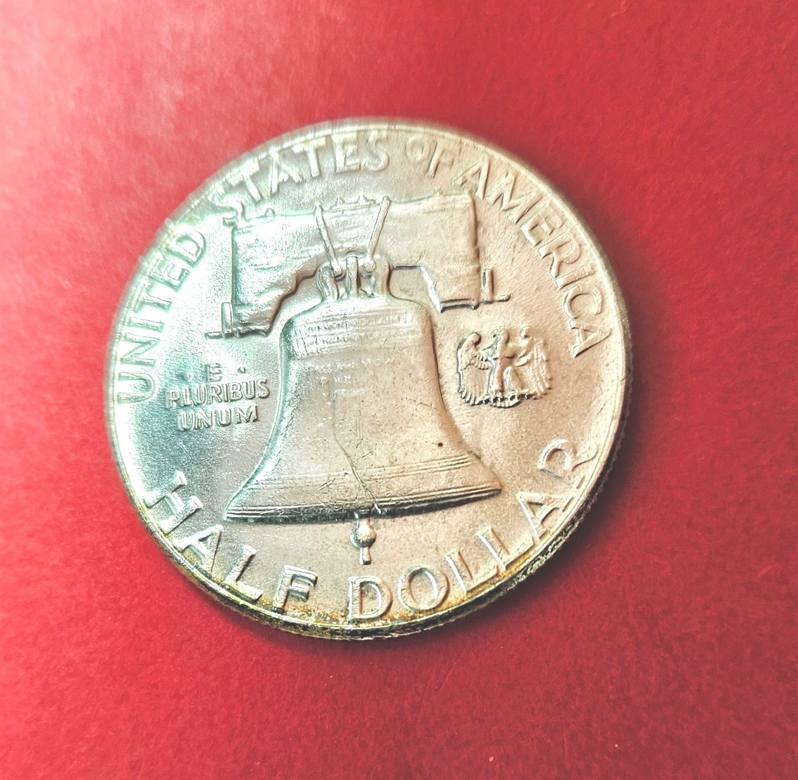 1957  Franklin Silver Half Dollar. About Uncirculated. Nice Bell Lines.