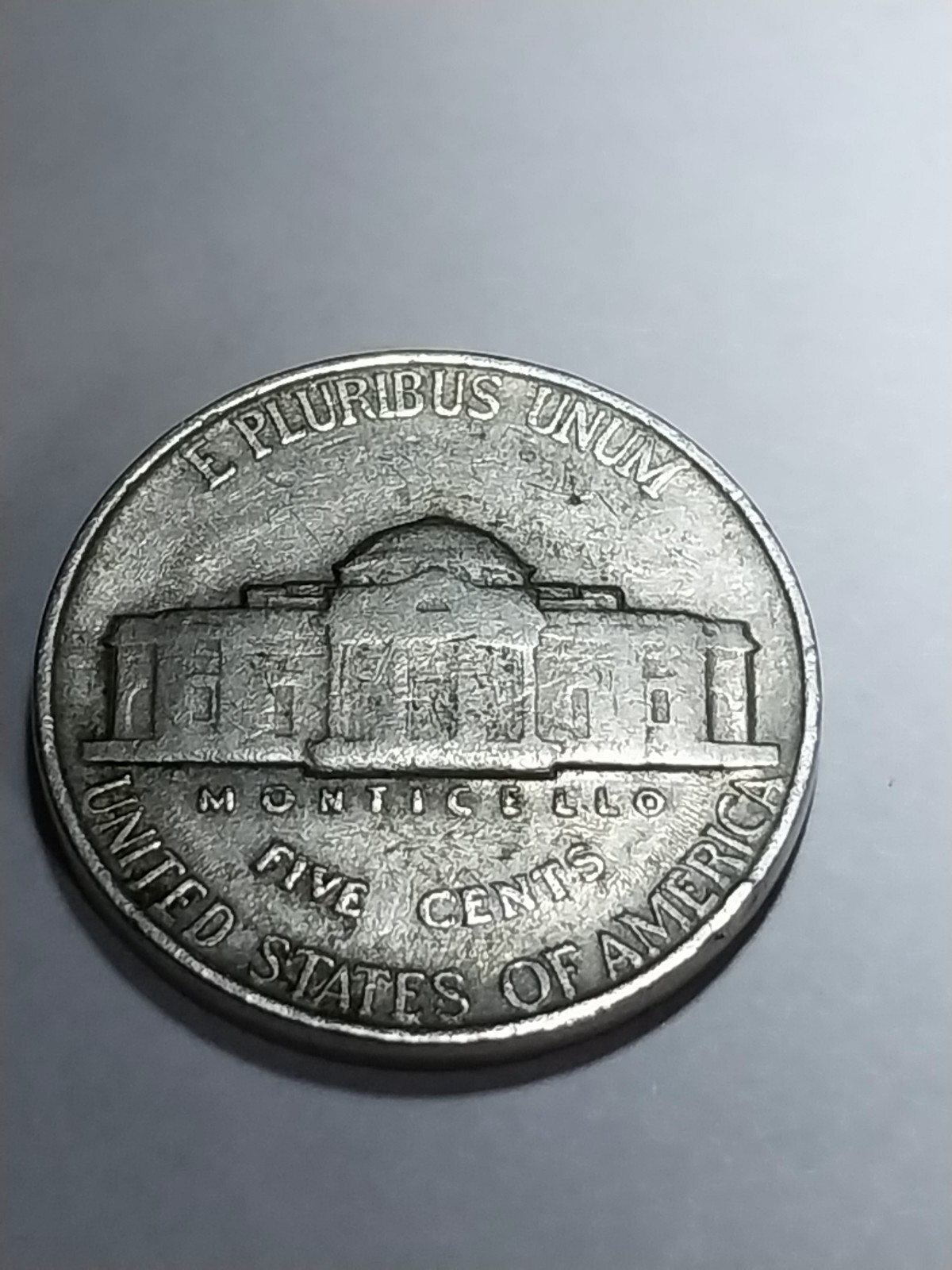 1939 Error Jefferson Nickel. Reverse Doubling. Circulated. Needs Cleaning.