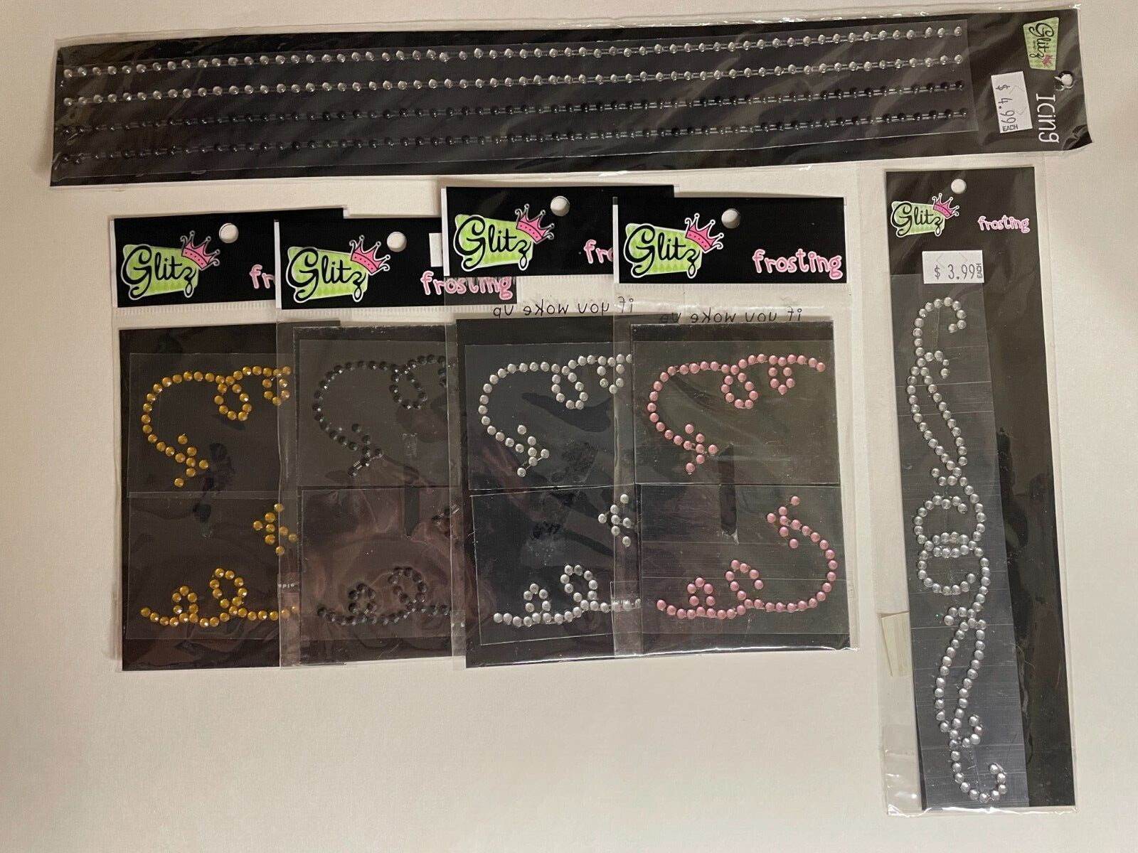 GLITZ DESIGN "FROSTING" RHINESTONES IN ASSORTED COLORS AND DESIGNS