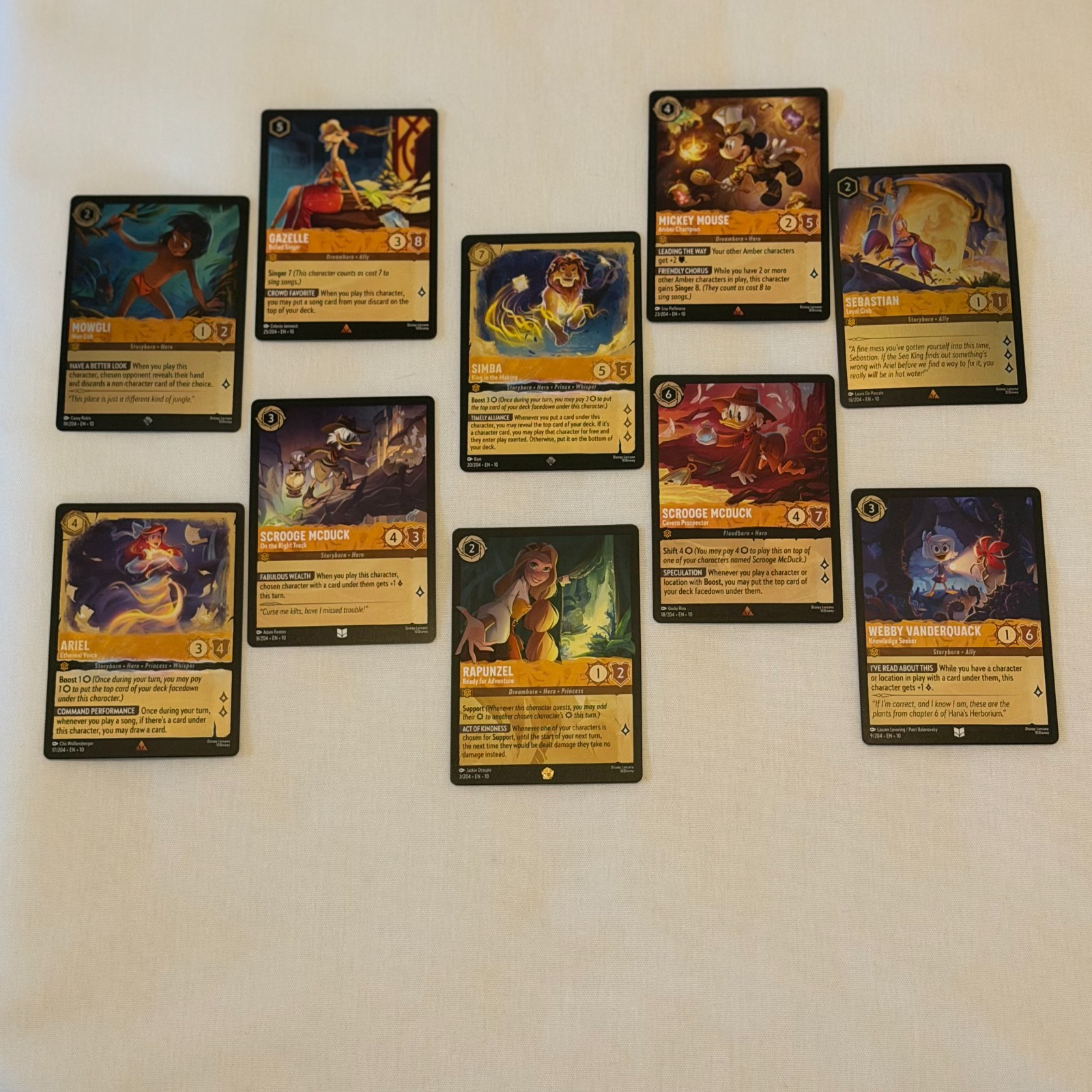 Lorcana Whispers in the Well AMBER Lot - Rapunzel Legendary +Mickey, and more...