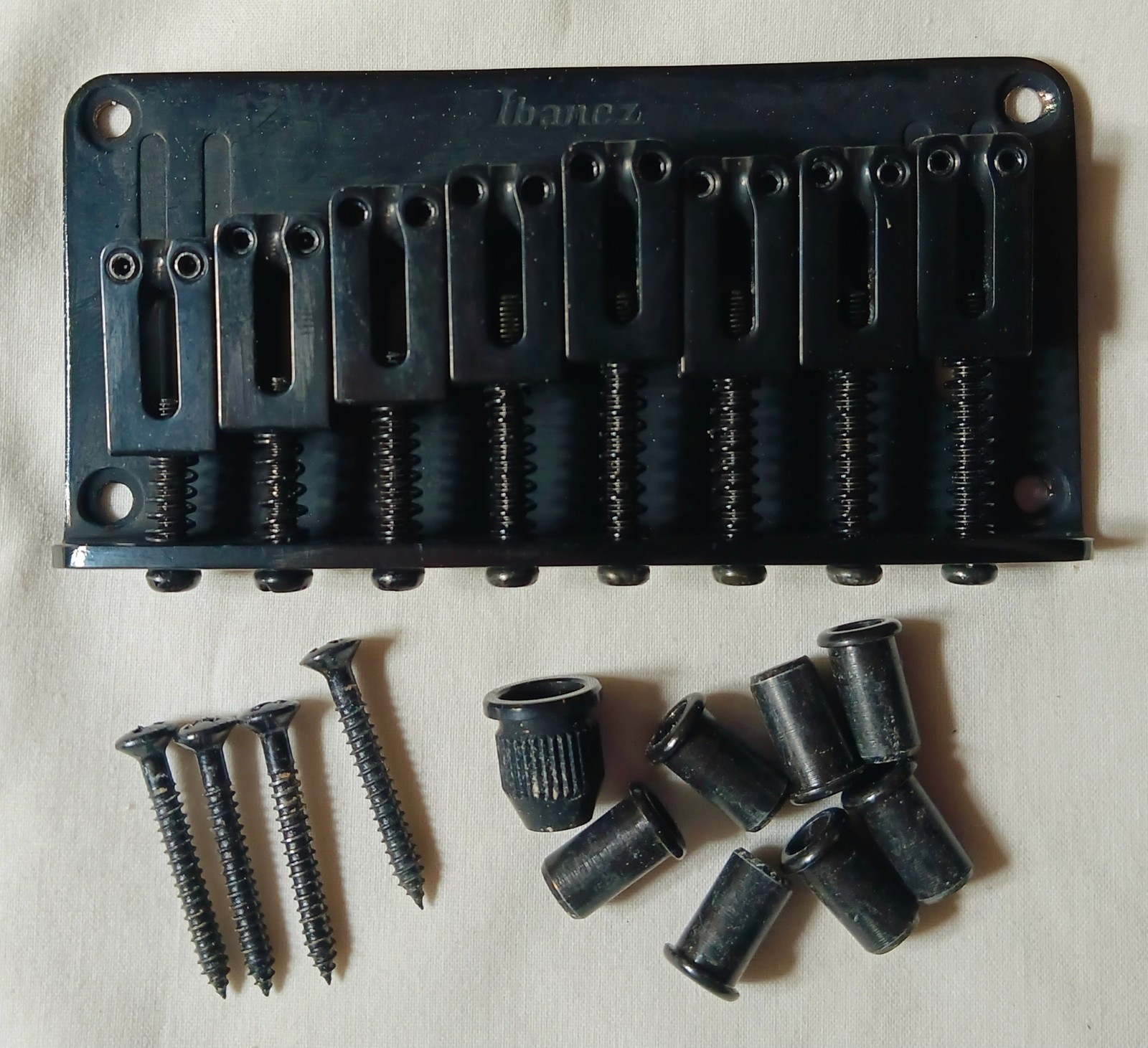 IBANEZ 8 String Black Fixed Guitar Bridge w/ screws and ferrules