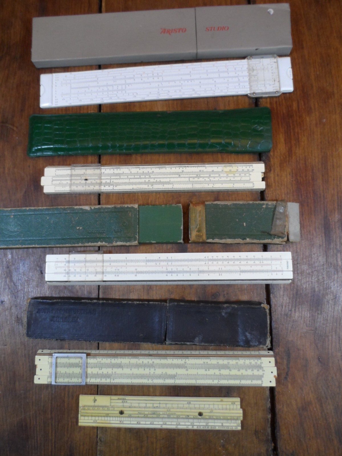 4 Vintage Slide Rules  Faber Castell 1/60, Mecthon 1957, Aristo Studio 968 & NH1