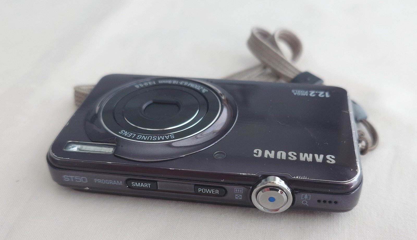 Samsung ST50 12.2MP Digital Compact Camera, With Charging Cable - Working Order