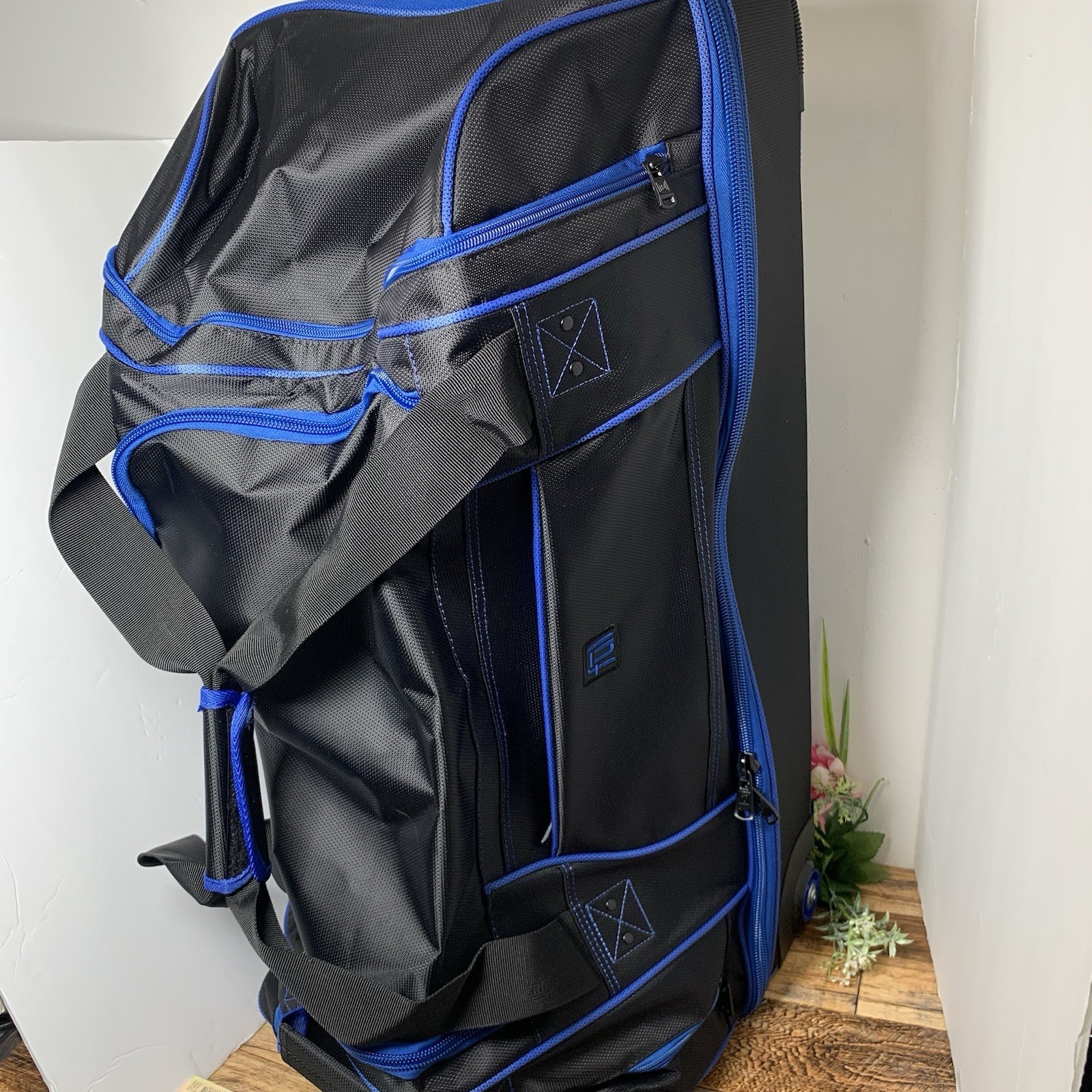 FŪL - Full Split Level Rolling Duffle Luggage Bag with Wheels - Black / Blue