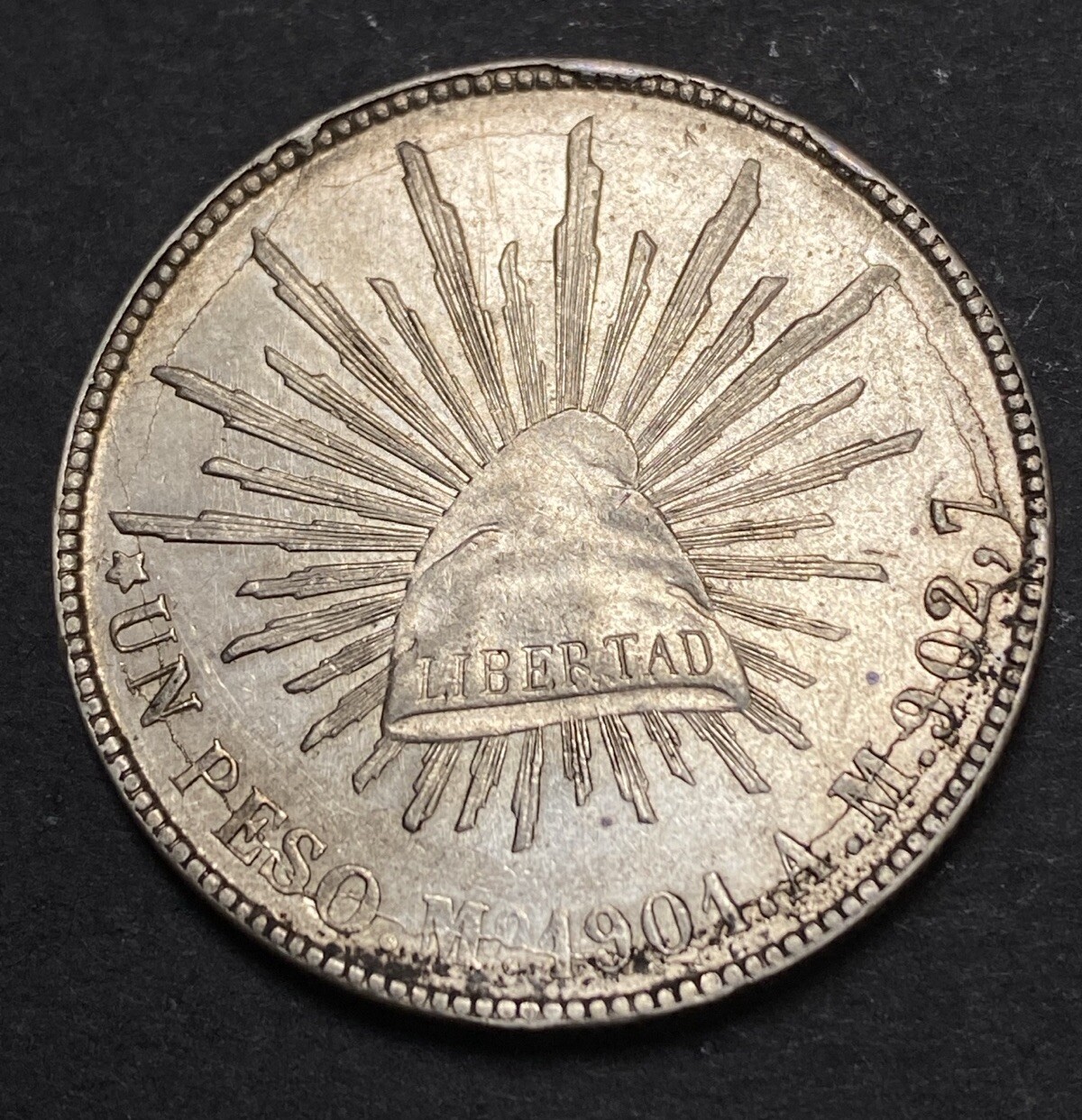 1901 Mexico Silver Peso Obverse & Reverse Lamination Left Extra Leaf Mint Error