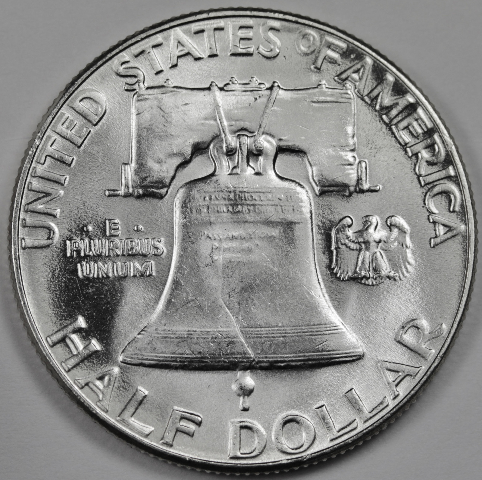 1953-p Franklin Half. Fully Separated Horizontal Bell Lines. BU. (Inventory)