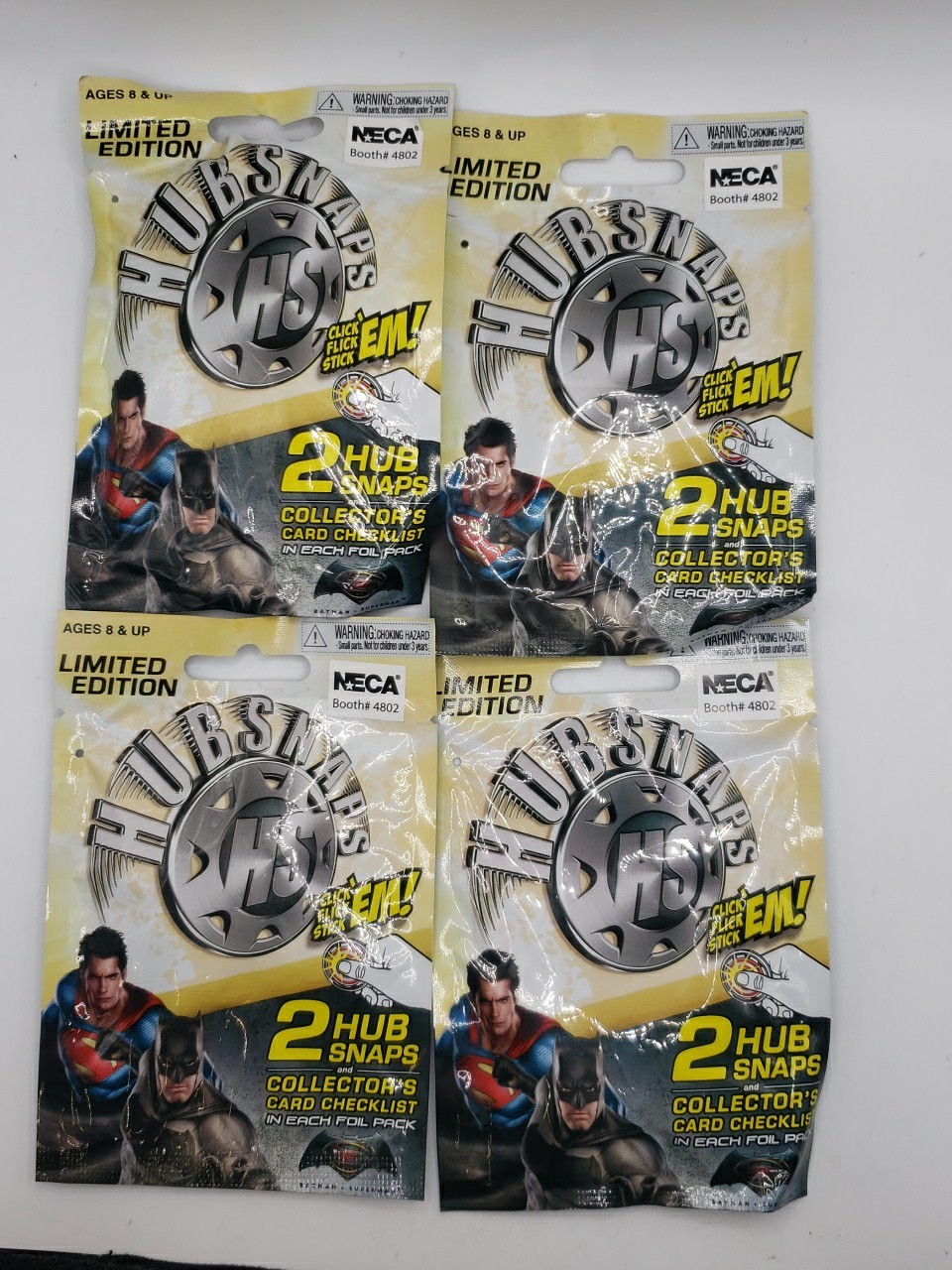 4 Packs of Hubsnaps Limited Edition Superman vs Batman Mystery Foil Packs - 2016