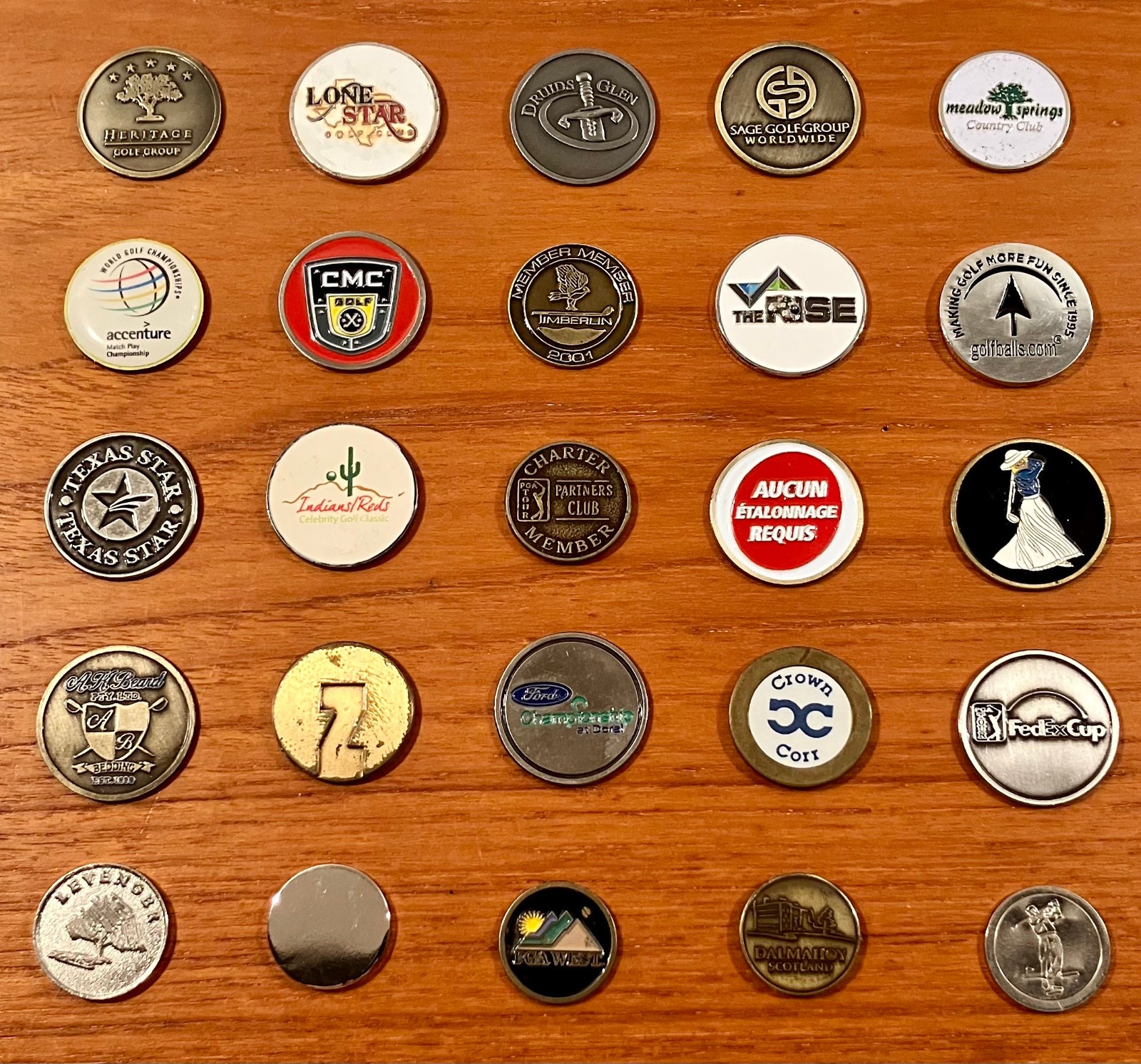 Lot of Twenty-Five (25) Flat Metal Logo Golf Ball Markers