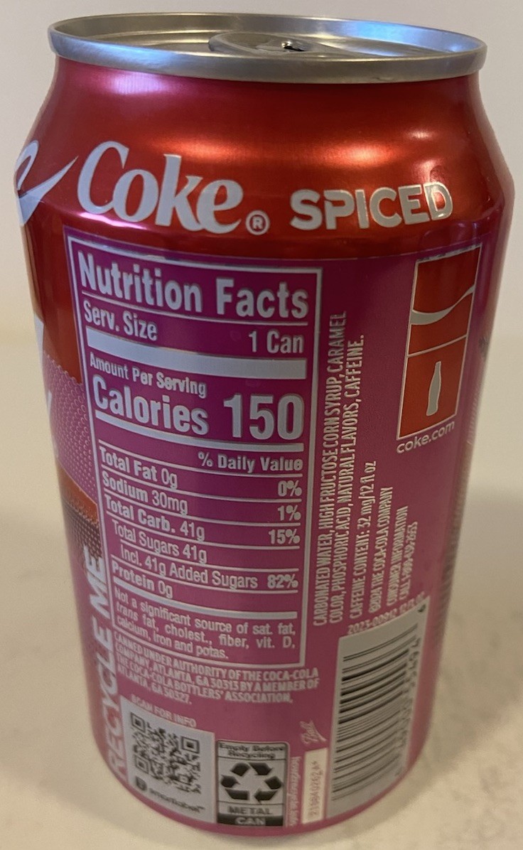 12 oz. COKE SODA CAN ( SPICED )EMPTY BOTTOM OPENED