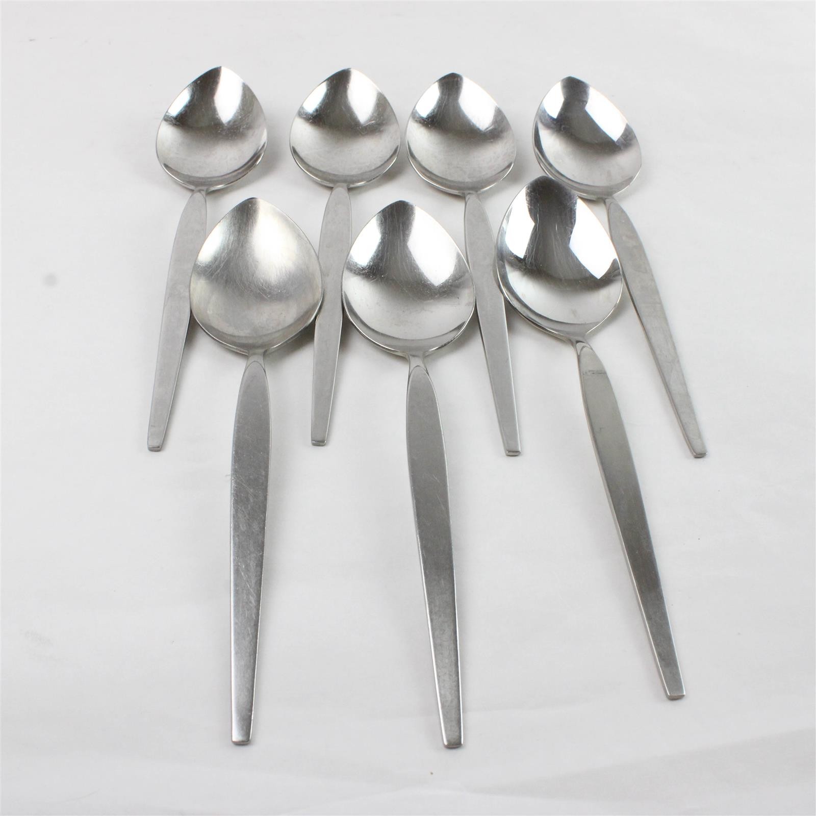 Lot of 7 Oneida Satinique Stainless Oval Place Spoons 7"