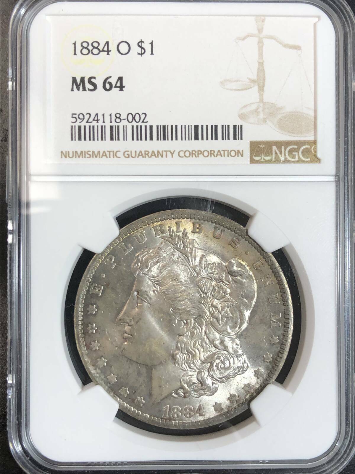 1884 O Morgan Silver Dollar NGC MS-64