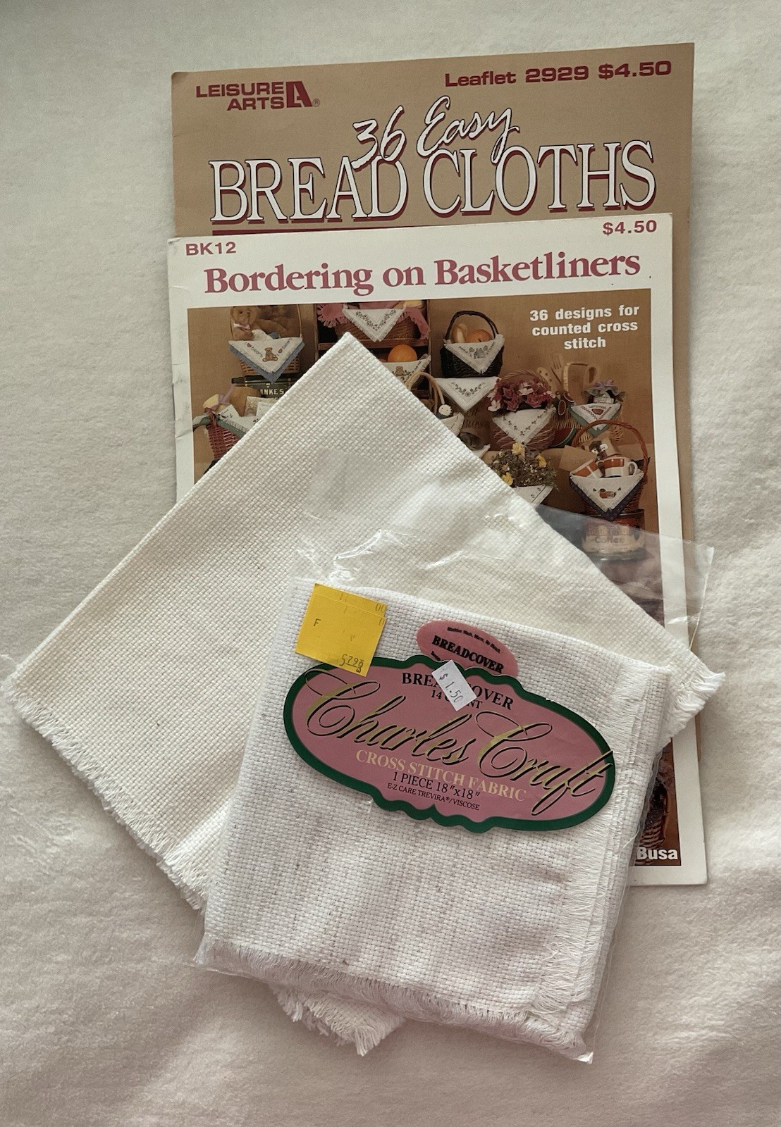 Lot Of 2 -14 Ct Bread Cloths,  And Leisure Arts Pattern Book 2929, Book 12