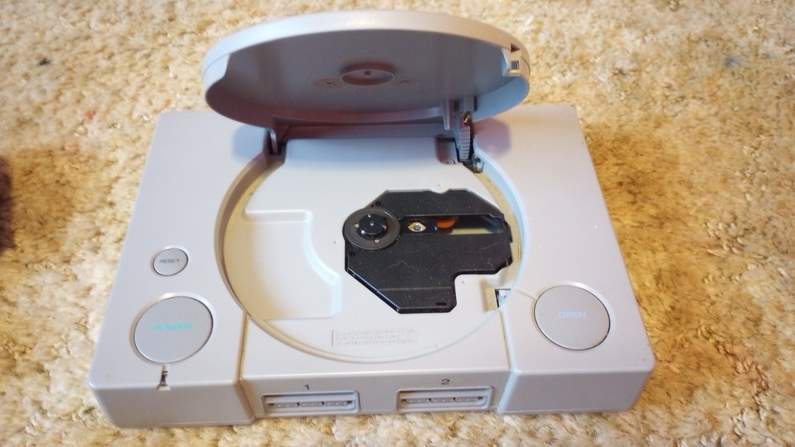 PlayStation 1 console with games