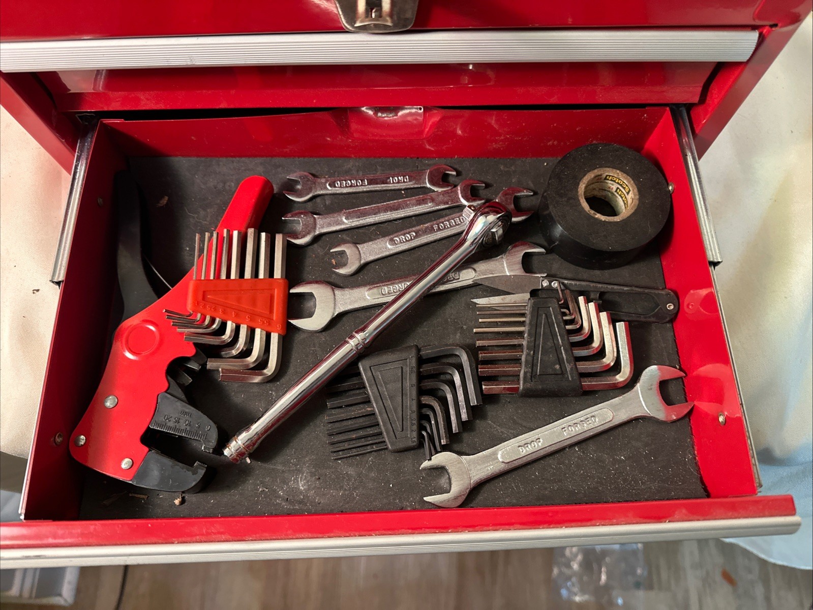 Small Red Tool Box With Assorted Tools