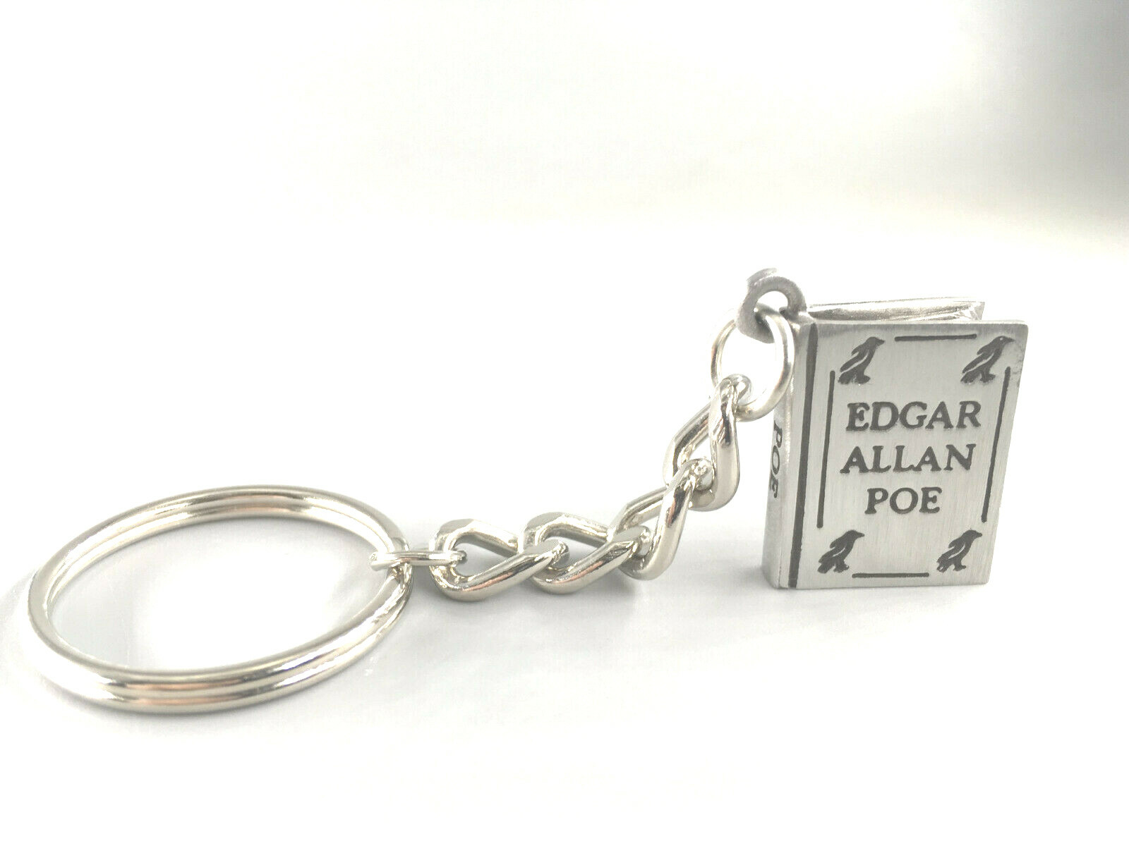 POE BOOK KEY CHAIN