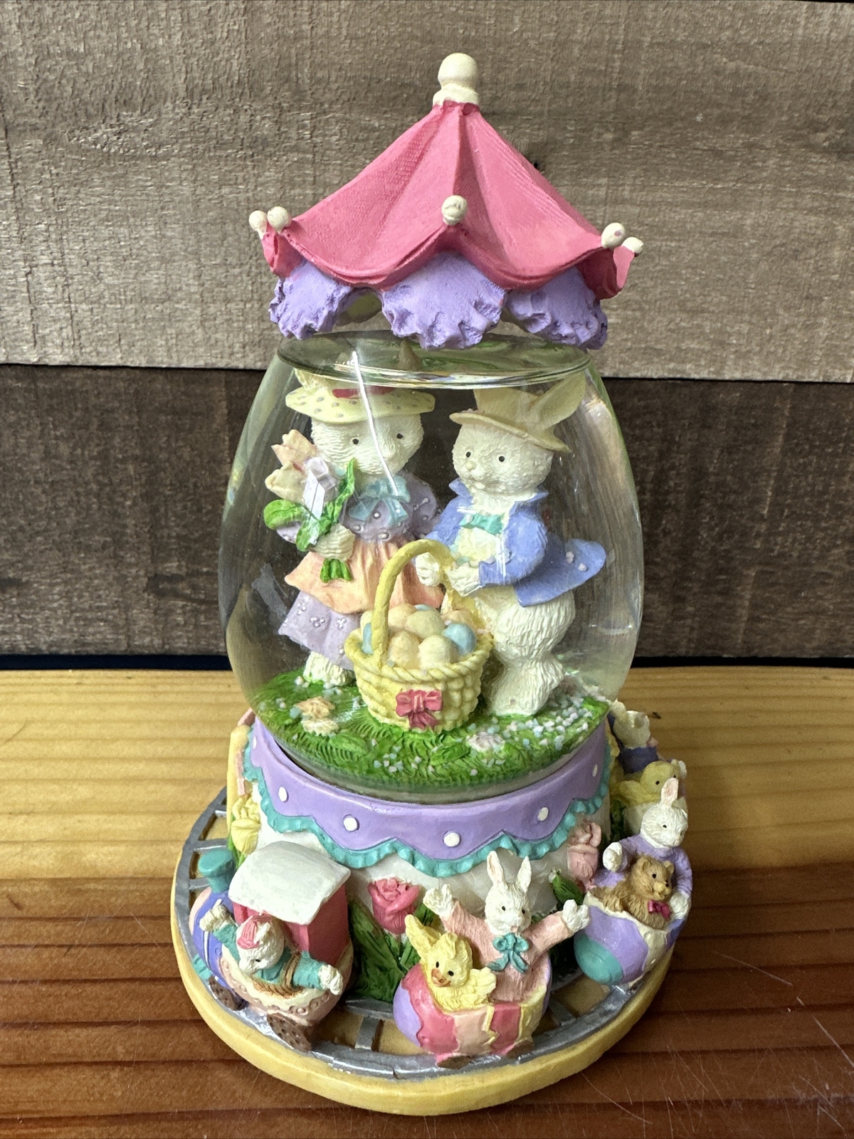 Easter musical snowglobe easter bonnet bunnies