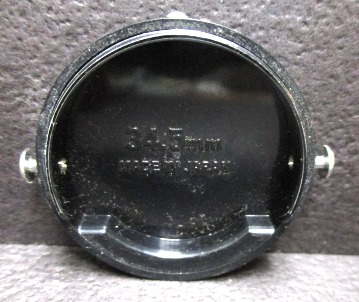 Nikon 34.5mm pinch on front lens cap.