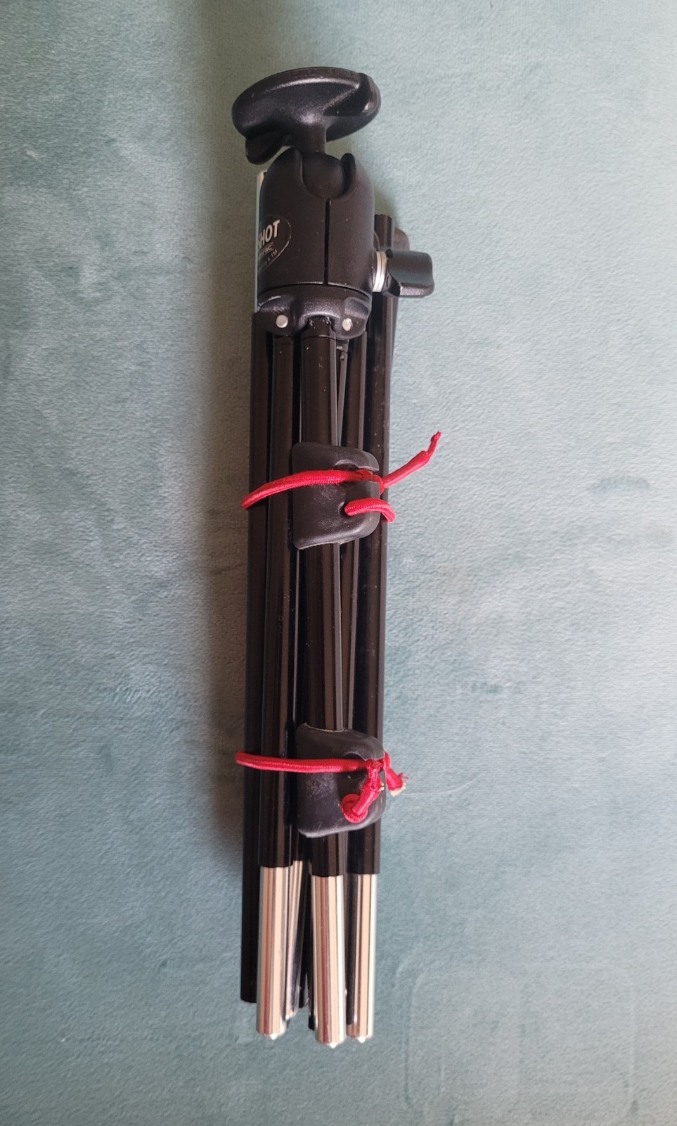 Small Compact folding Tripod 9” unfolds to 28” tall.