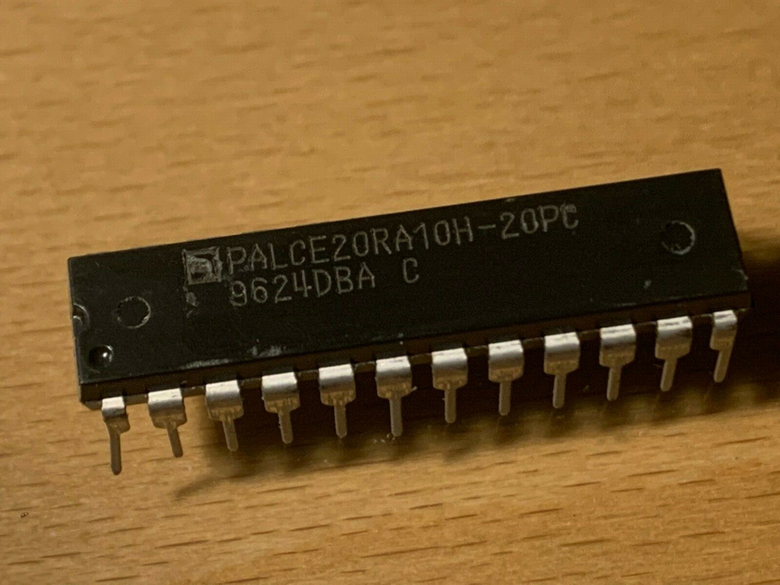 PALCE20RA10H-20PC- Electrically Erasable PAL Register Array, 20ns, DIP-24.