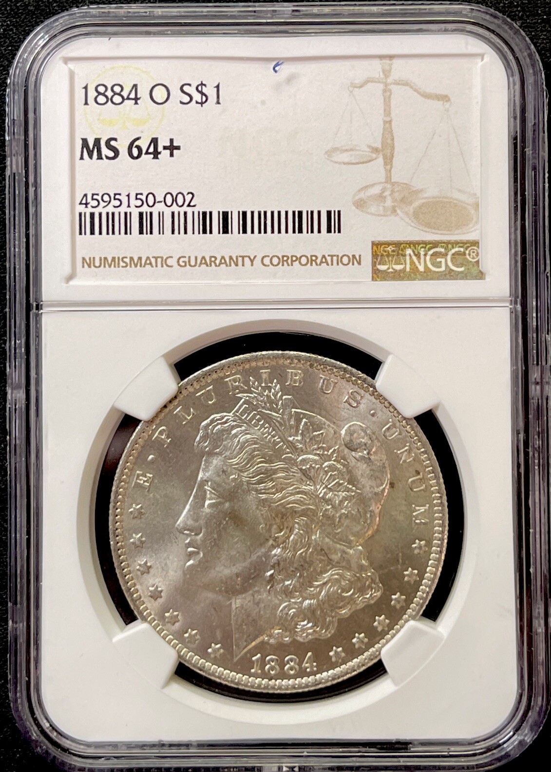 1884 O $1 Morgan Silver Dollar NGC MS64+. ENN Coins