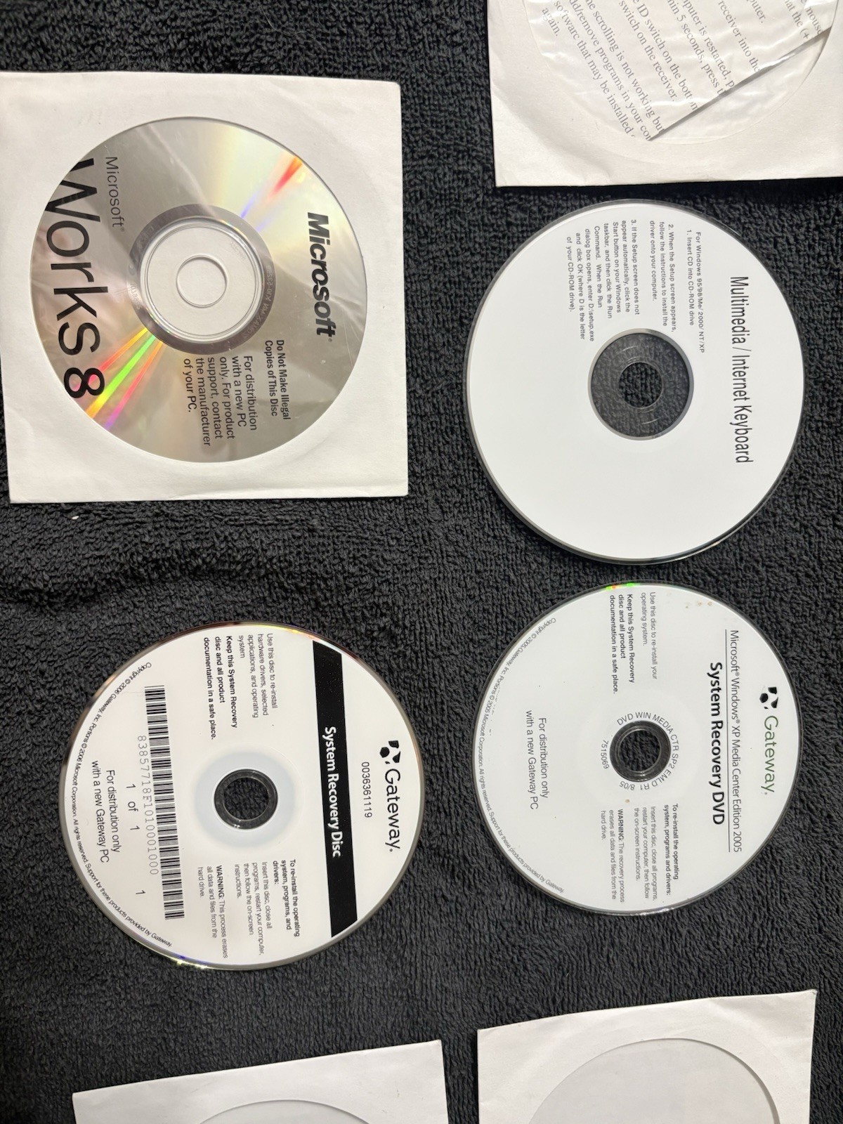 Microsoft Works 8 and Windows XP Media Center Edition 2005 Lot