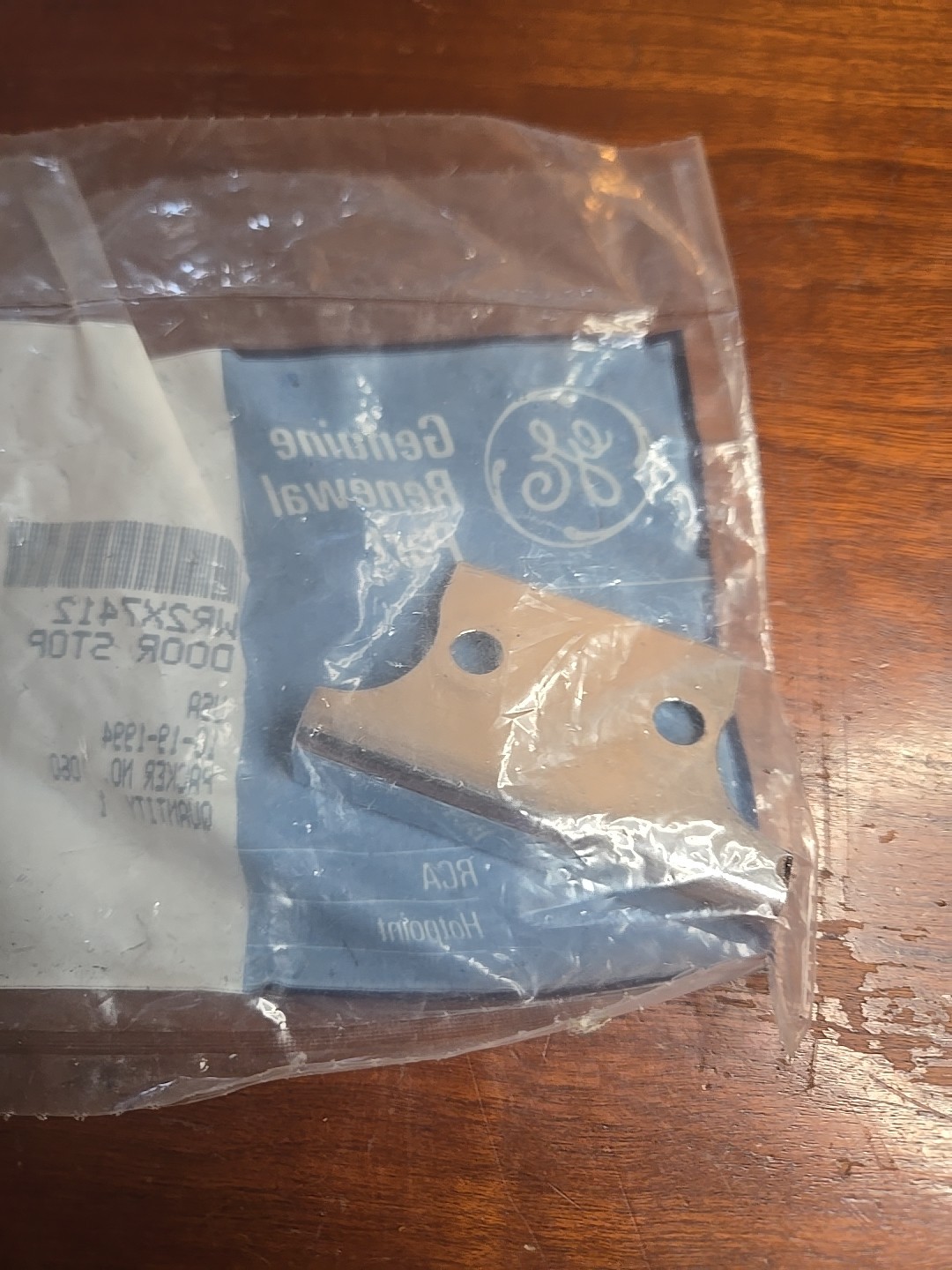Genuine OEM GE WR2X7412 Door Stop (9E2)