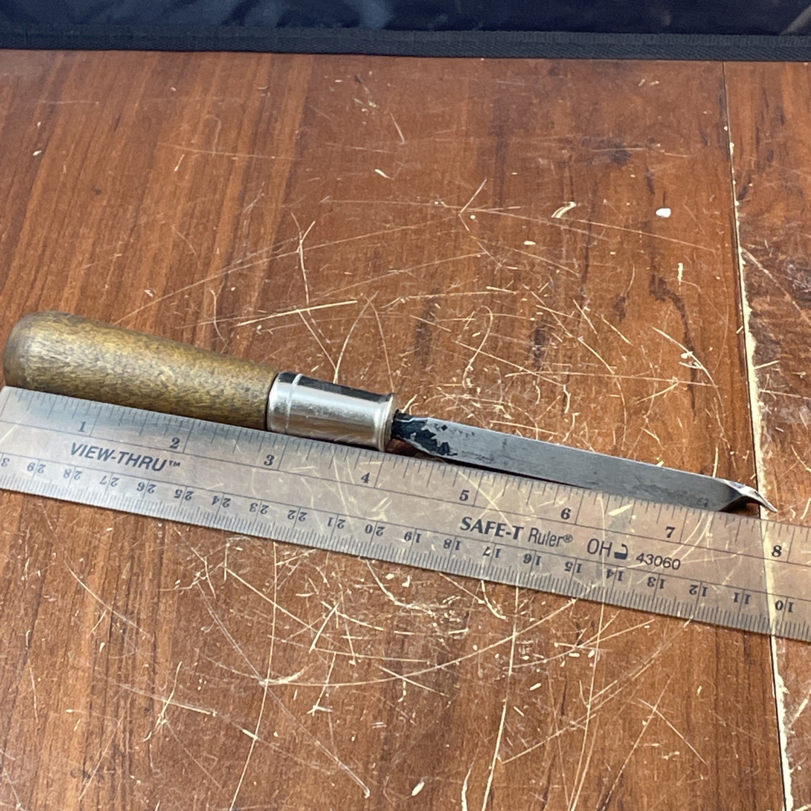 Triangular Scraper