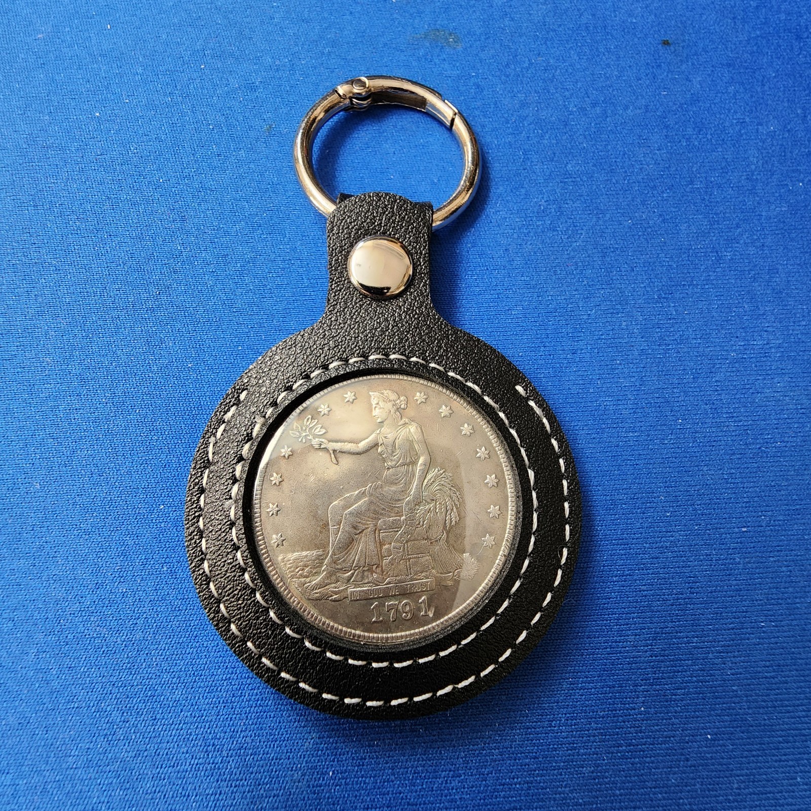 KEYCHAIN: 1791 Trade Dollar Style – Silver-Plated Coin Design in Leather Holder