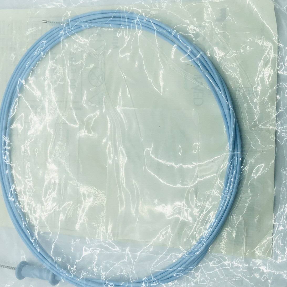 One BLUE DISPOSABLE SCOPE VALVE + CHANNEL CLEANING BRUSH