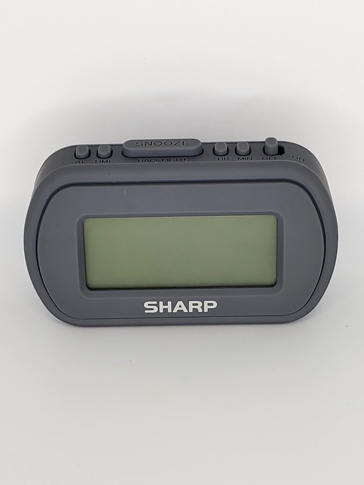 Sharp Digital Alarm Clock With Blue LED Backlight Rubberized Case Battery Power